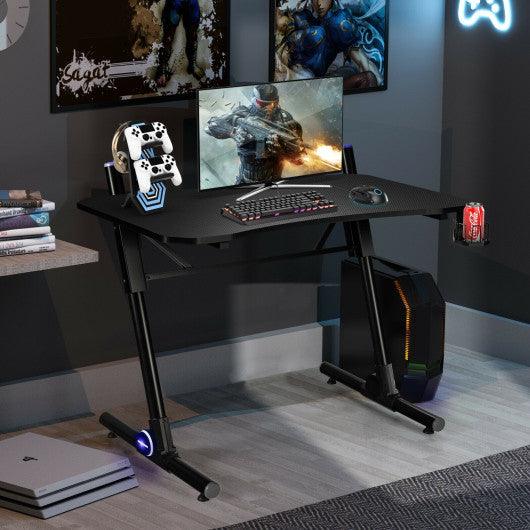 43.5 Inch Height Adjustable Gaming Desk with Blue LED Lights at Set Shop and Smile